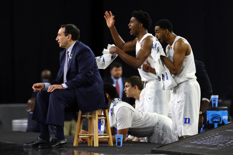 Illustration for article titled Eight Photos Of Coach K Sitting On A Lil' Stool